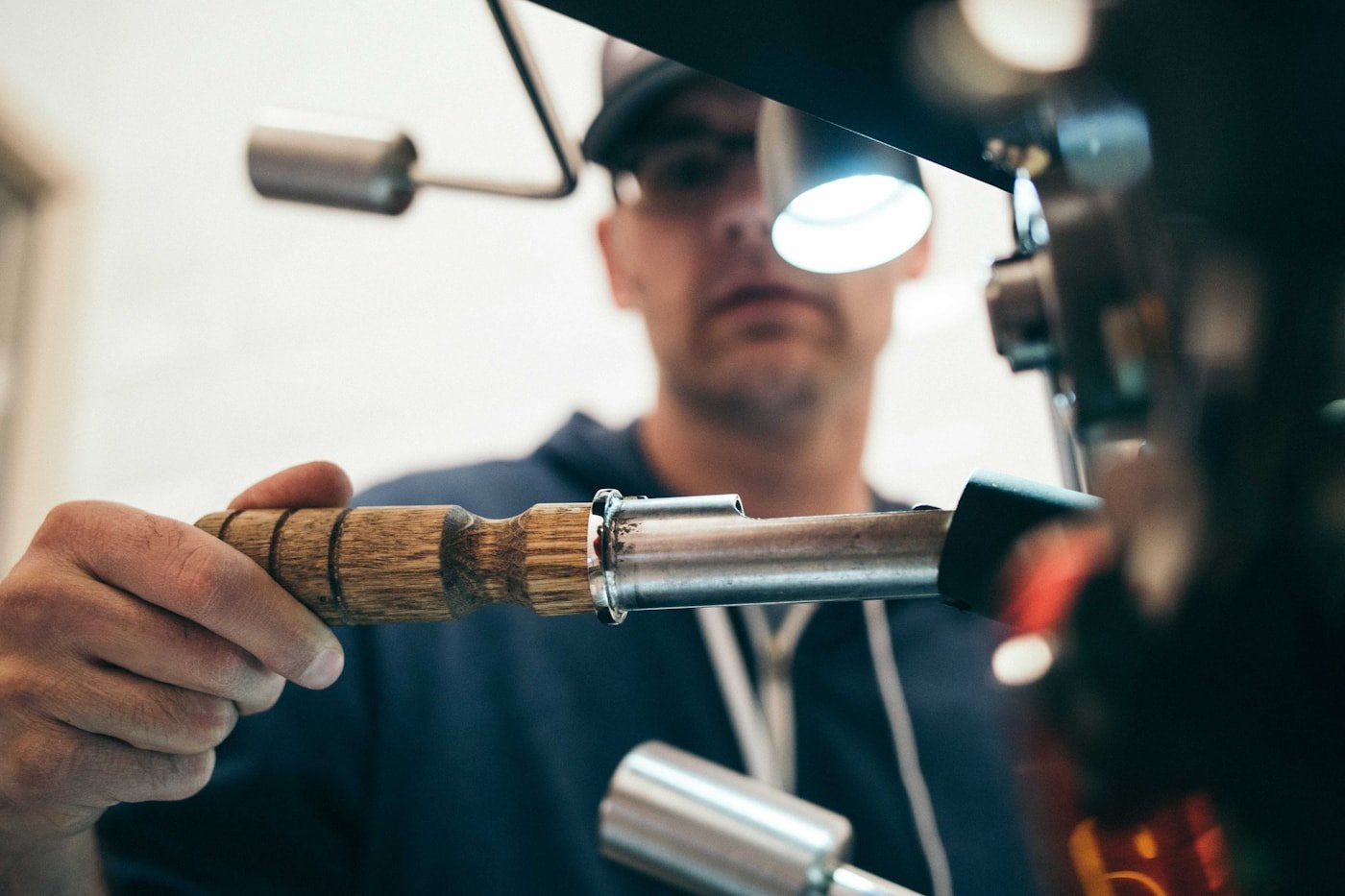 Locksmith cutting and fitting keys on a key machine